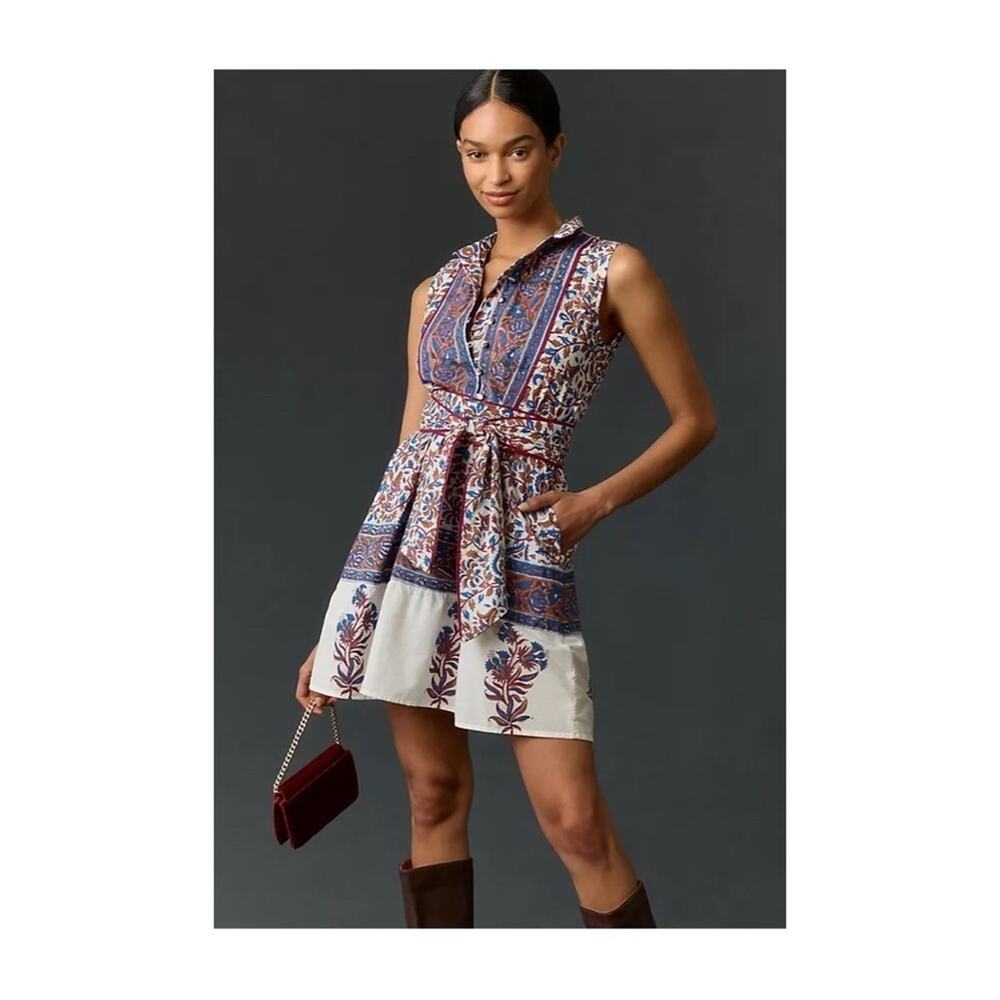 Sue Sartor Sleeveless Flounce Mini Dress